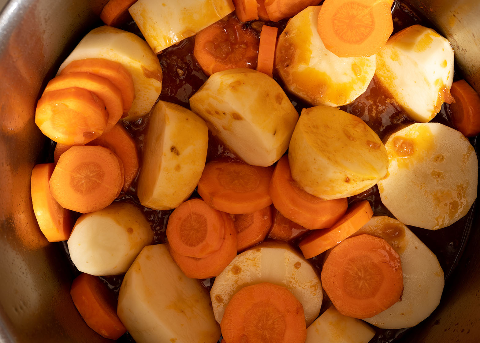 veggies and potatoes on a pot