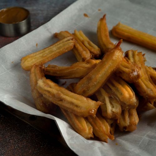 a pic of churros on a pan