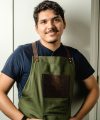 Peruvian Chef Brandon Castillo owner of Chewinghappiness in an apron