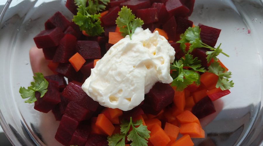 a pic of veggies on a bowl with mayo