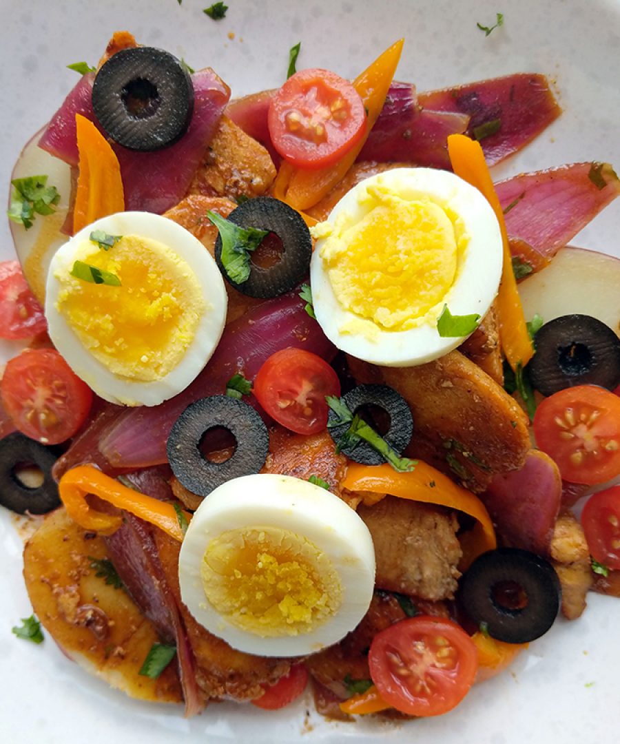 escabeche de pollo peruano con huevo duro aceitunas y tomates cherry - peruvian escabeche de pollo with hard boiled eggs olives and cherry tomatoes