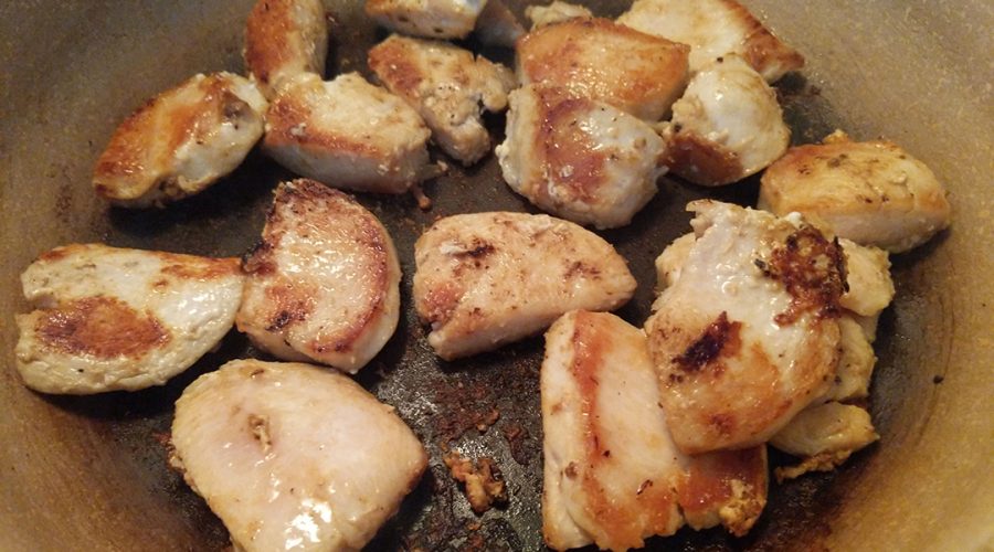 a pic of chicken being cooked