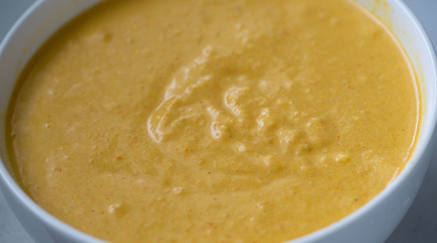 a pic of a bowl with Hauncaina sauce on it