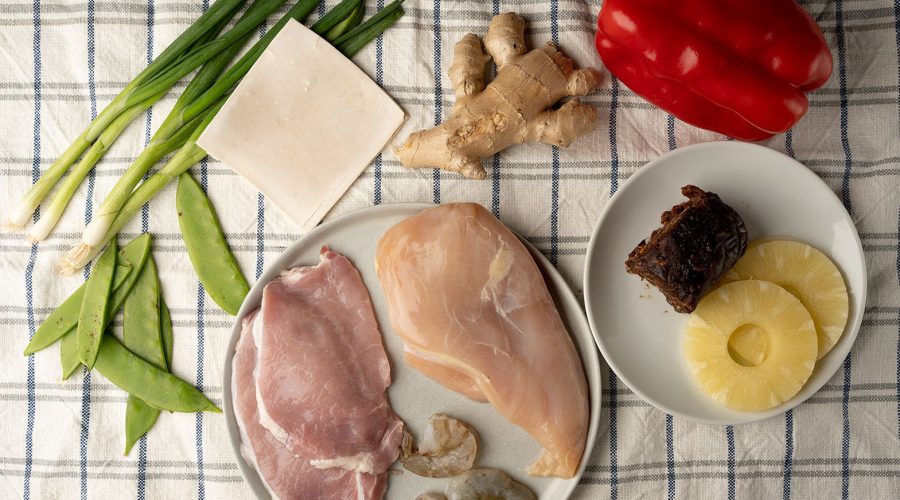 raw ingredients on a table for a Kam Lu Wantan
