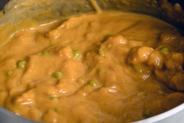 Locro de Zapallo with peas - creamy Peruvian squash stew with green peas added at end