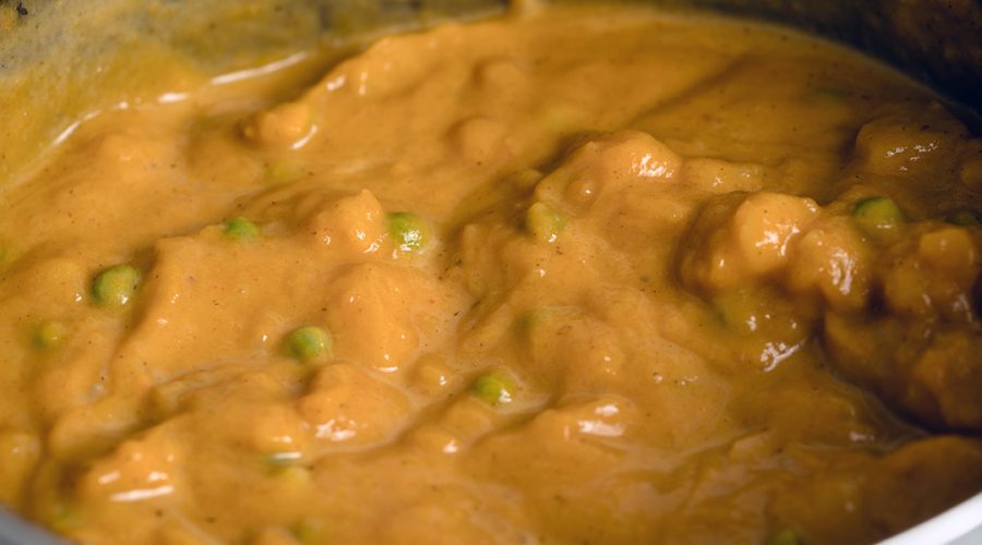 Locro de Zapallo with peas - creamy Peruvian squash stew with green peas added at end