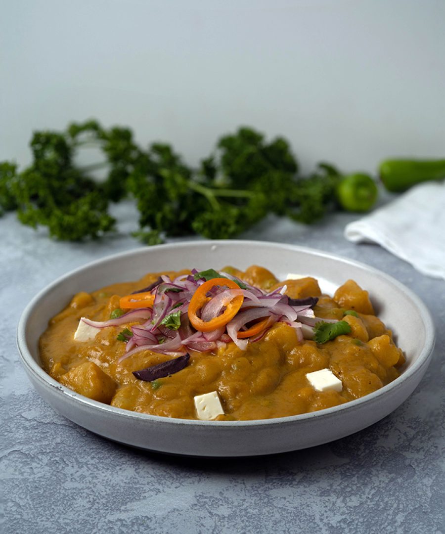 Locro de Zapallo peruano - Peruvian spicy pumpkin stew served with sarsa criolla and queso fresco