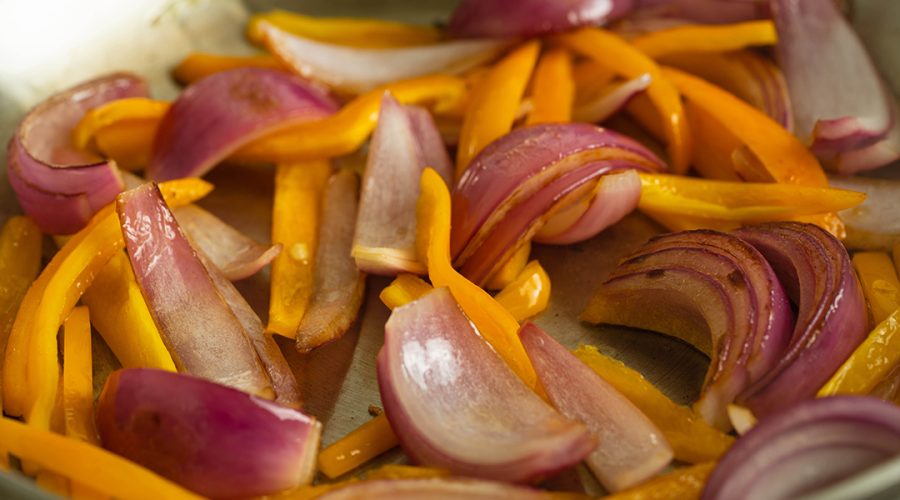 onions and peppers being sautee