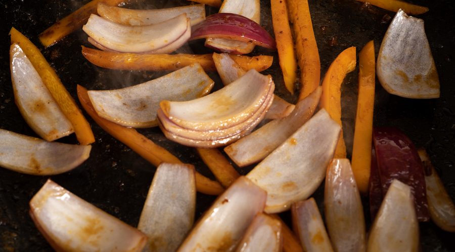 Onions and peppers being cooked