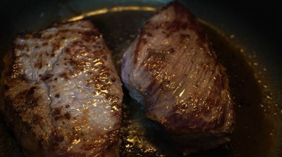 beef searing in pot for Peruvian seco de res - carne sellada en olla para seco de res peruano